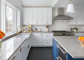 HANDOUT PHOTO: Brass hardware and fixtures lend a fresh, updated look to this Anthony Wilder kitchen. (Photo by John Cole)